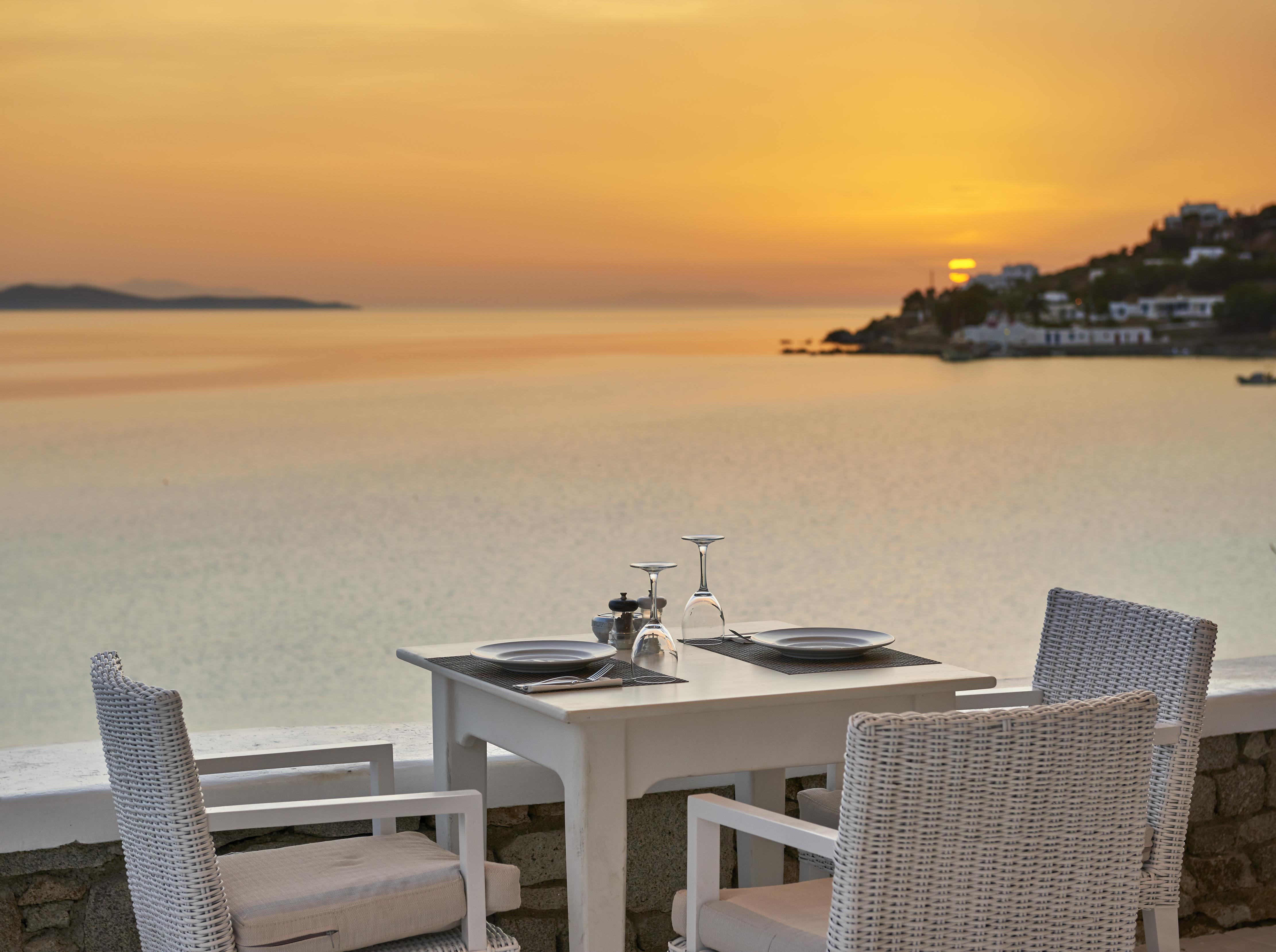 Saint John Hotel Villas&Spa Agios Ioannis Diakoftis Esterno foto Sunset at the restaurant