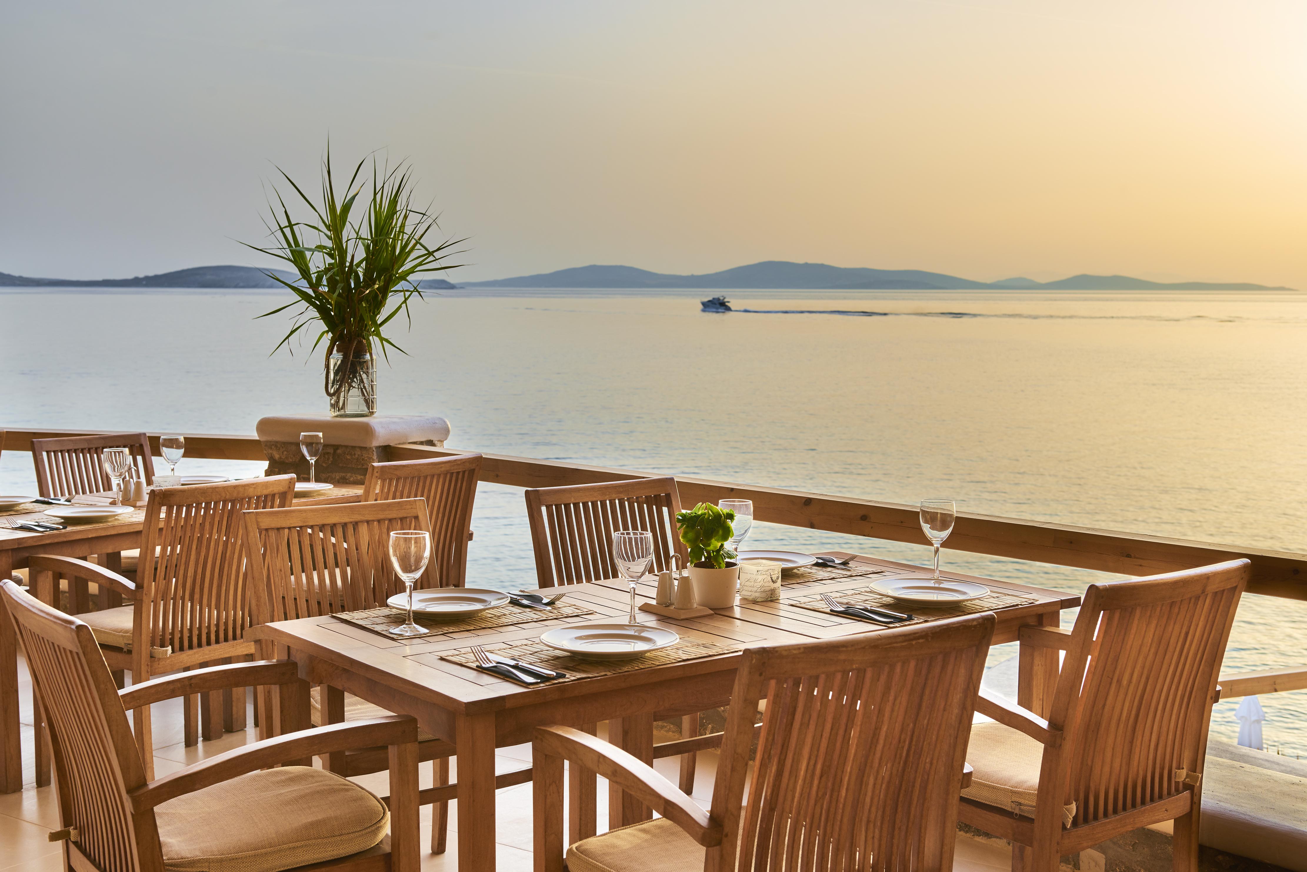 Saint John Hotel Villas&Spa Agios Ioannis Diakoftis Esterno foto Sunset at the restaurant