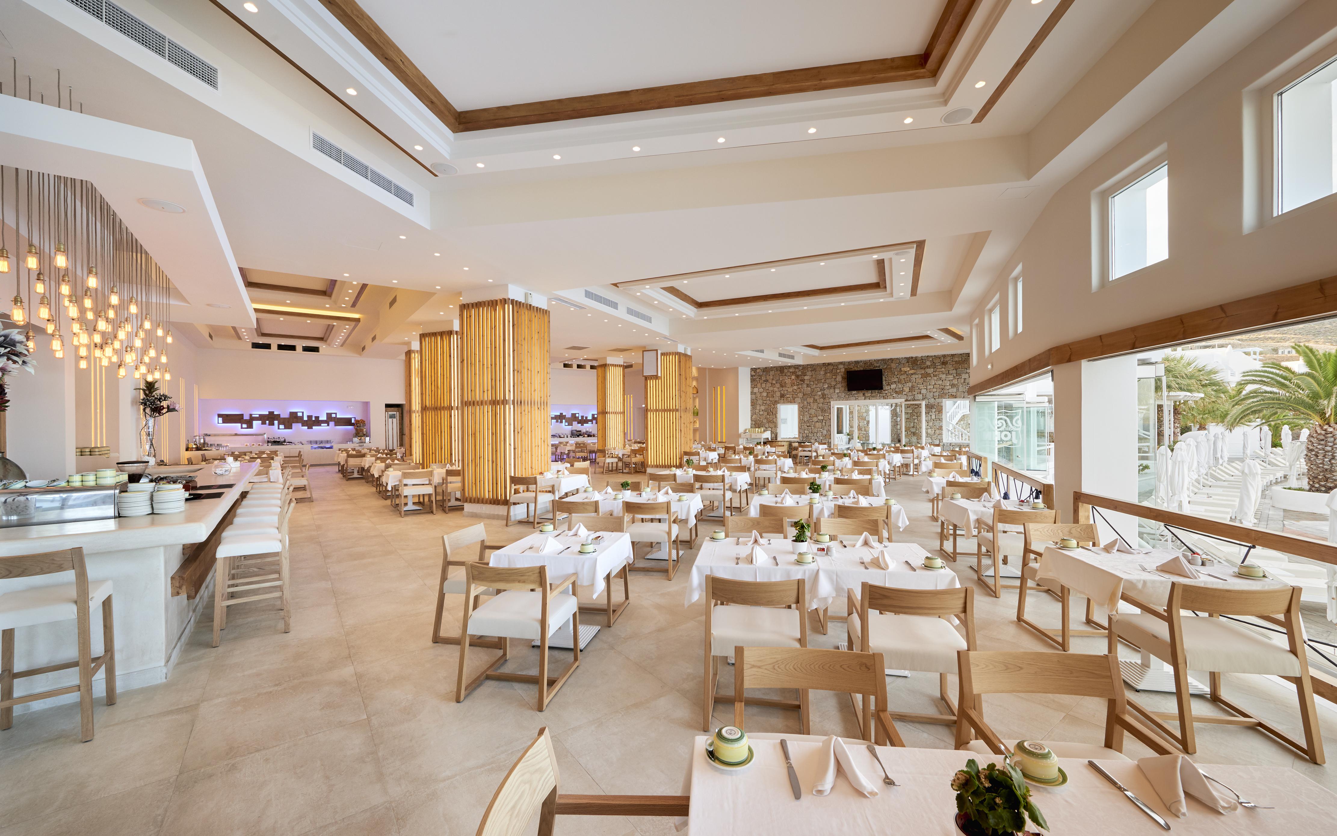 Saint John Hotel Villas&Spa Agios Ioannis Diakoftis Esterno foto The restaurant at the resort