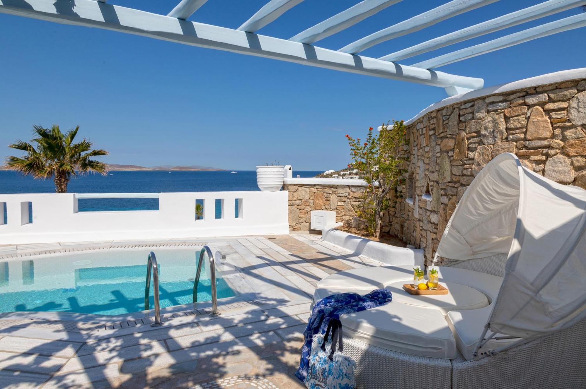 Saint John Hotel Villas&Spa Agios Ioannis Diakoftis Esterno foto A private pool at a luxury hotel in Mykonos, Greece